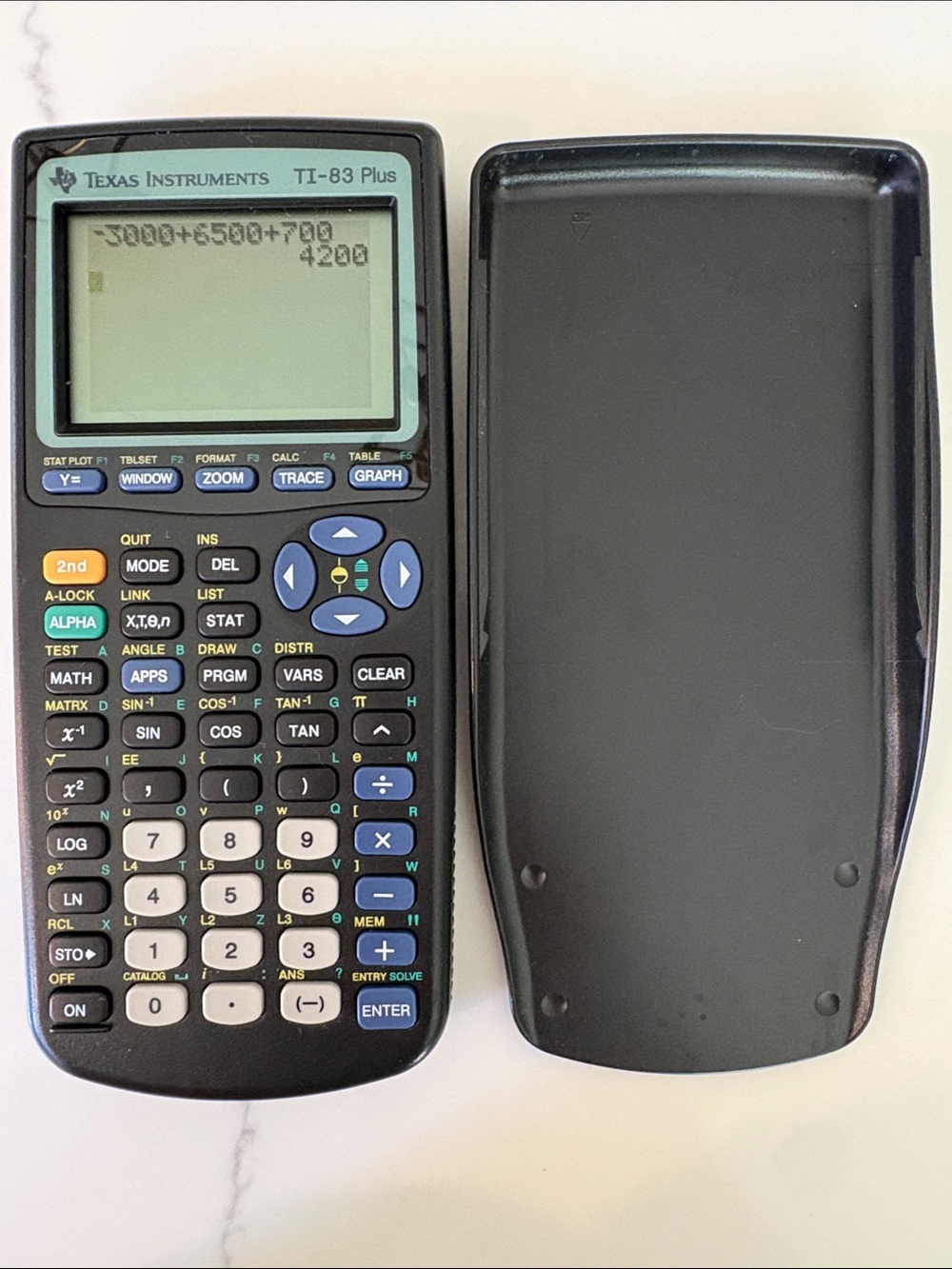 Texas Instruments TI-83 Plus Graphing Calculator - Black/Gray/Light Blue